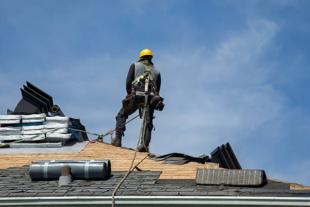 Professional Gutter Installation technician working in Bloomington, IN
